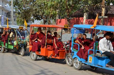 Between sites by rickshaw.